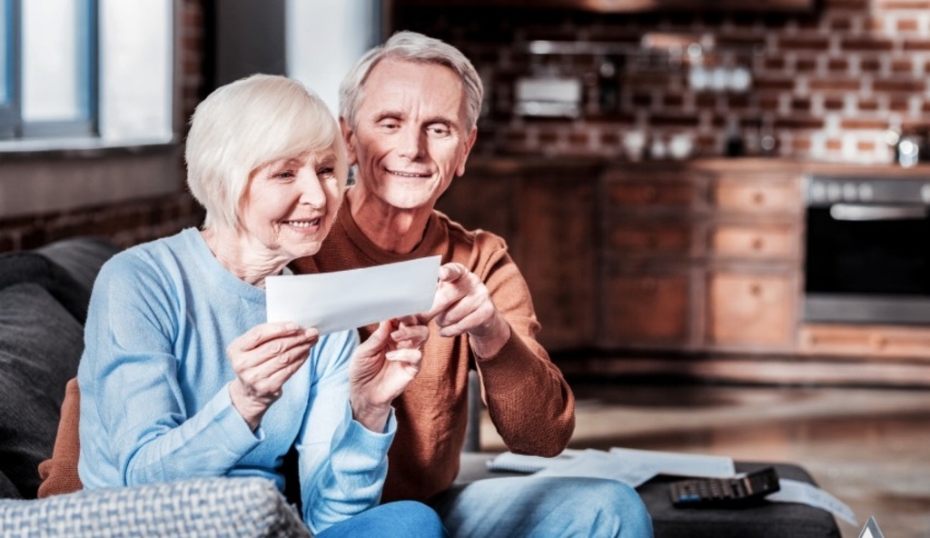 Senior couple looking at paper